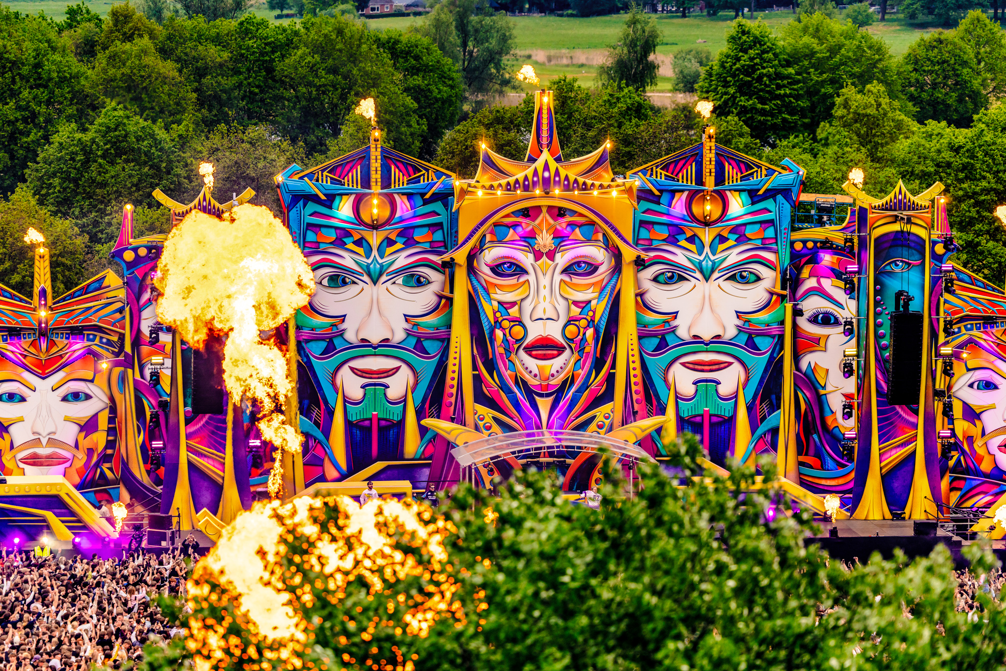 Colourful stage with painted faces and fireballs at Dance4Liberation 2026, Zwolle