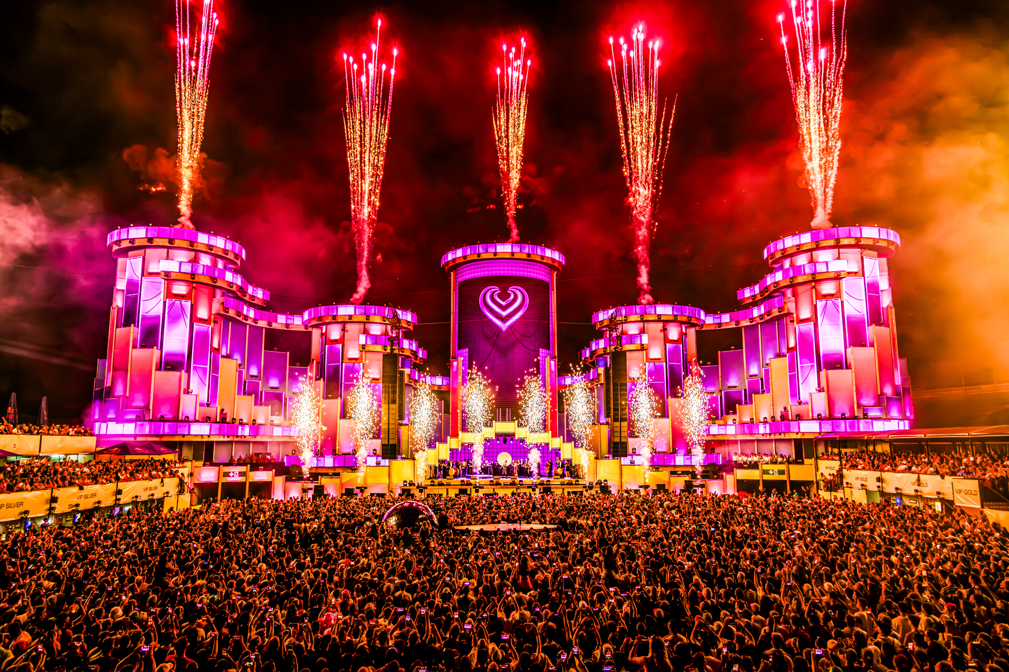 Pink-lit mainstage with heart logo and fireworks at Electric Love Festival 2026