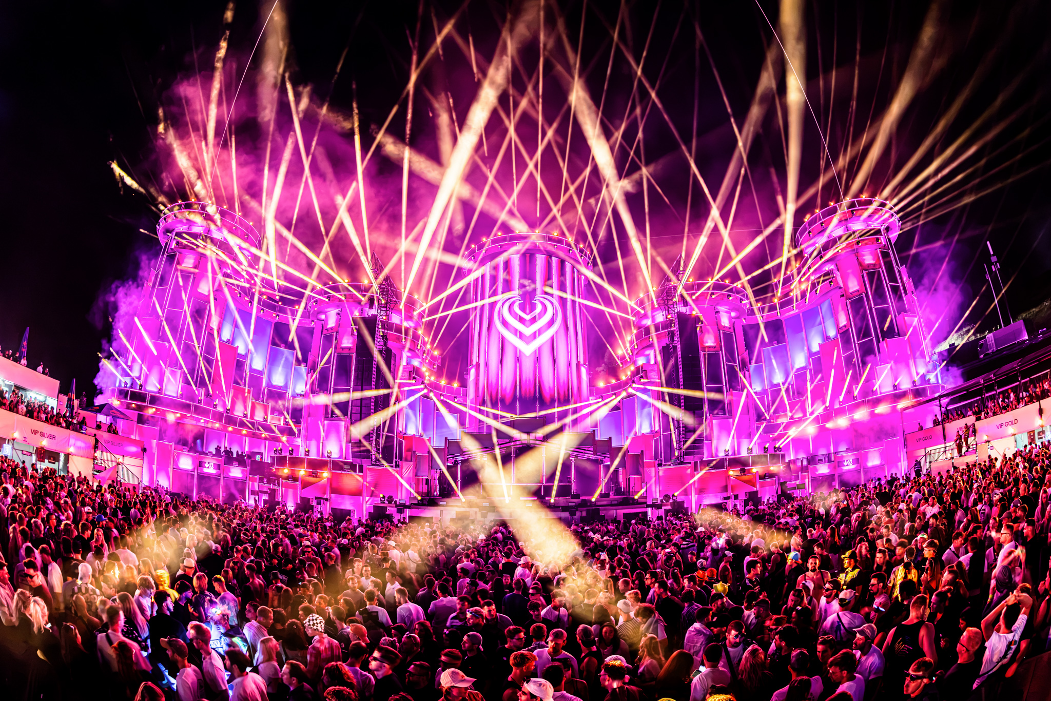 Pink lasers and the heart mainstage at night at Electric Love Festival 2026